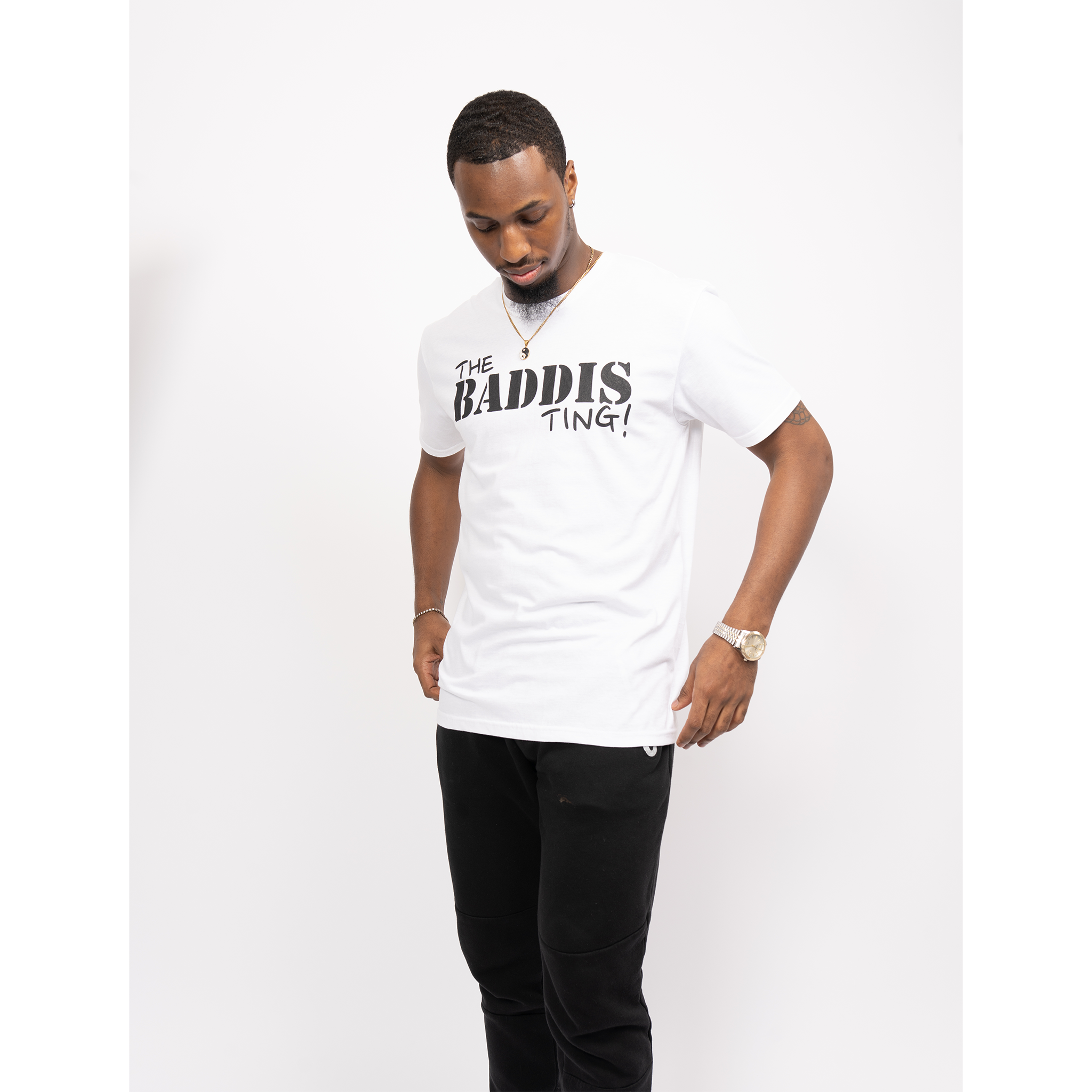Male Model is wearing The Baddis Ting Unisex White Soft Style T Shirt